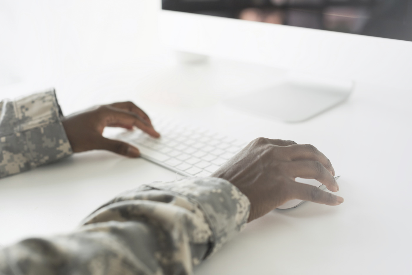 Military officer using computer army technology